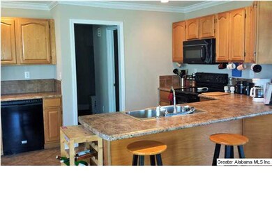 Open kitchen with breakfast bar