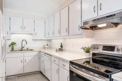 Galley kitchen w/ counter seating