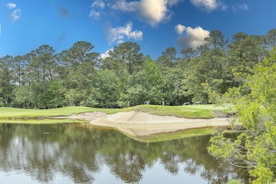 Water view featuring a tree filled landscape