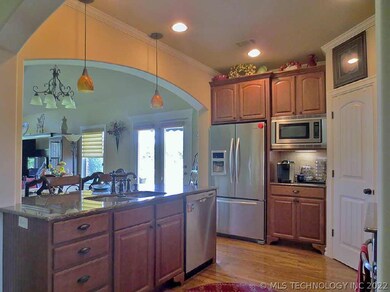 At the end of the entry, is the Kitchen which open