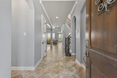 Mahogany front door.  Beautiful 24 X 12 tile.