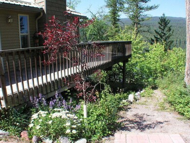 Landscaping and path to lake