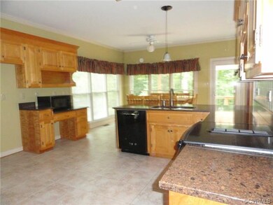 Kitchen with ceramic floor and granite countertops