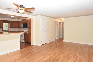 Living area with view of kitchen