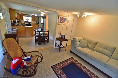 The open format living room, dining area and kitch