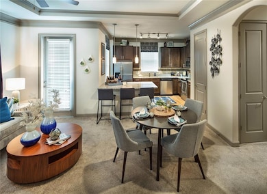 Dining room featuring crown molding, light colored