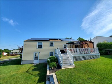Huge fenced in yard with large deck