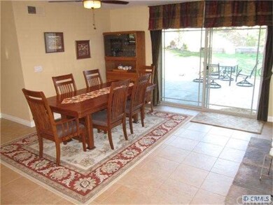 Spacious dining room with direct access to back ya