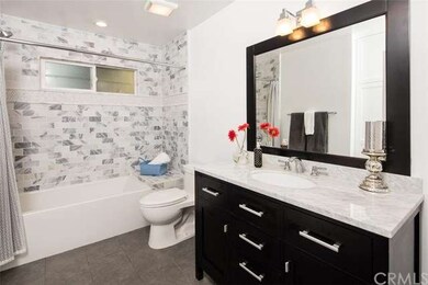 hall bath with carrera marble shower and vanity co