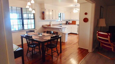 View of the dining room looking into the kitchen.