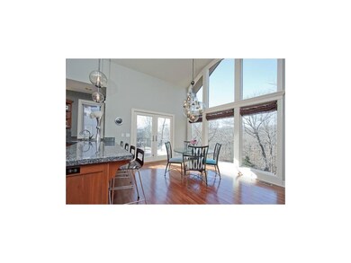 Vaulted ceiling and wall of windows with amazing v