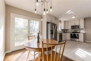 Kitchen/Dining Combo with new lighting.