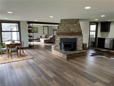 Open and spacious floor plan with feature wood bur
