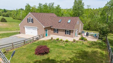 View of front facade featuring a garage and a fron
