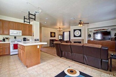Kitchen looking towards open concept living areas.