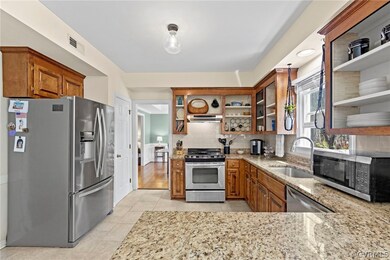 Kitchen with appliances with stainless steel finis