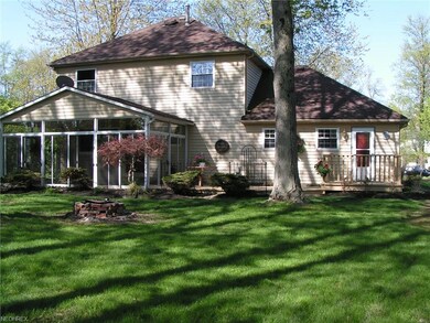 Rear elevation of the home showing the sun room an