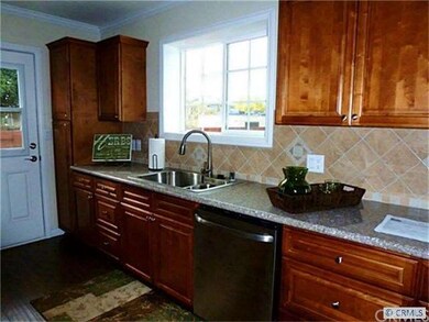 Alternative view of kitchen. Notice all the storag