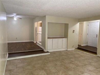 Spare room featuring a textured ceiling and ceilin