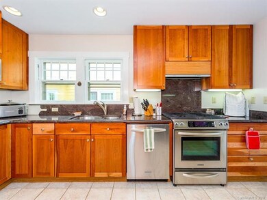 Updated kitchen with stainless steel appliances.