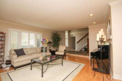 Beautiful living room with hardwood floors, recess