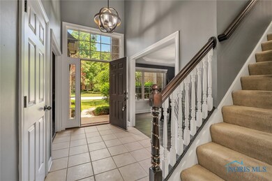 Beautiful entry with vaulted ceilings