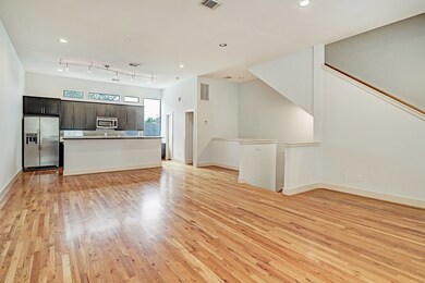 Reverse view of room. Seated island area, stainles