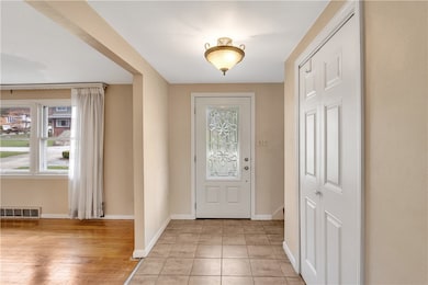 Welcoming Entry! Newer Front Door! Spacious coat c