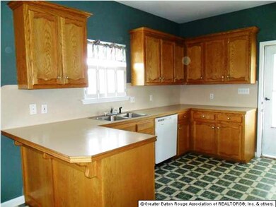 Kitchen - window overlooks driveway