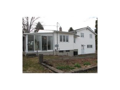 Rear view.  Walkout lower level from family room.