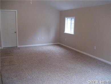 Family Room. family room facing back,door leads to