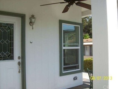 Front Porch with ceiling fan.