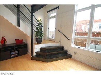 Den/Family/Great Room - Open staircase in the sunn