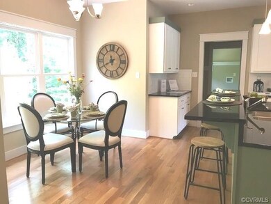 KITCHEN STAGED.  CUSTOM CABINETS, ISLAND, GRANITE,