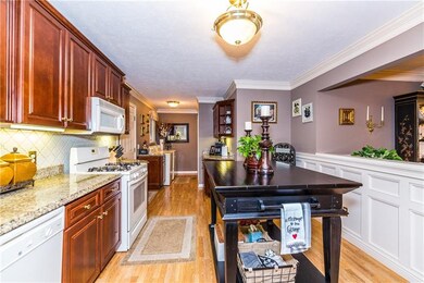 The kitchen easily accommodates an island work sta