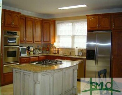 Kitchen. Kitchen has granite countertops, traverti