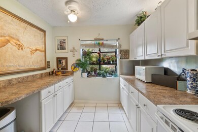 3705 Carambola Cir N unit 2834, Coconut Creek, FL 33066 - photo 7