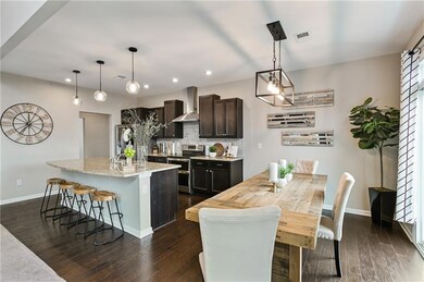 Kitchen with tasteful backsplash, stainless steel 
