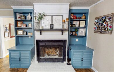 Wood burning Fireplace and Custom Cabinets