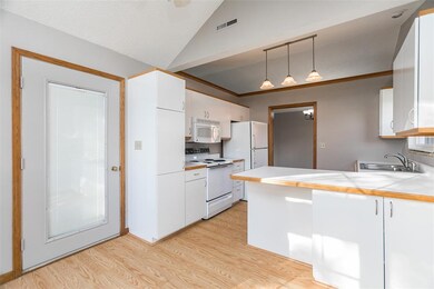 Kitchen with door to deck