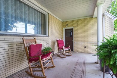 Covered front and rear porches.