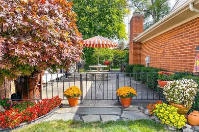**  Neighbors share this delightful patio **courty
