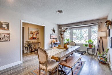 Bay windows in the dining room bring in plenty of 