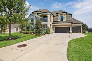 This stunning stucco estate boasts an impressive and elegant appearance.