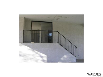 Stairs into carport