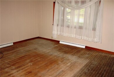 Spacious living room with picture window.