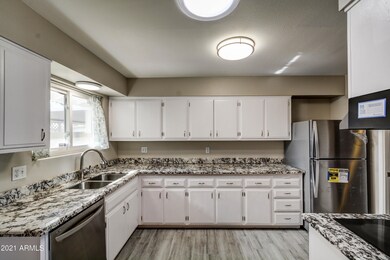 9933 W La Jolla Cir S, Sun City, AZ 85351 - photo 2