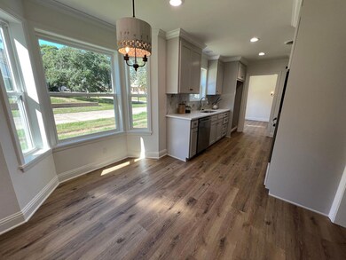 Kitchen featuring sink, stainless steel dishwasher