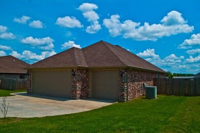 Three car garage with easy access to front of home