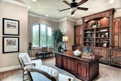 downstairs OFFICE/DEN or BEDROOM: travertine floor